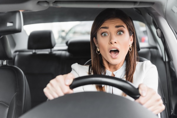 female facial expression prior to auto accident