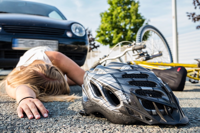 Personal Injury, bicycling accident hit by a car